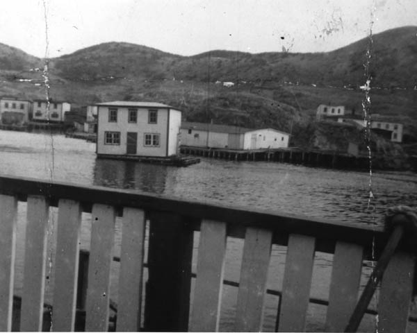 013: John Ryan's house on a raft being floated to Southern Harbour. (circa 1967) [courtesy of Sadie (Norman) Kerrivan]